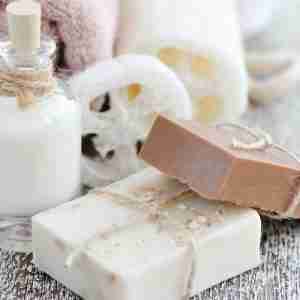 close up shot of goat milk and goat milk soap